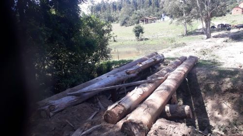 Serviço de adequação de estradas e pontes no interior de Guamiranga